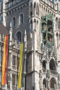 Munich town hall with flags Stock Photos