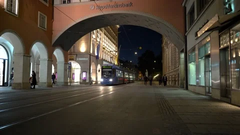 Munich tram passing by slowly at night Stock Footage 170896800