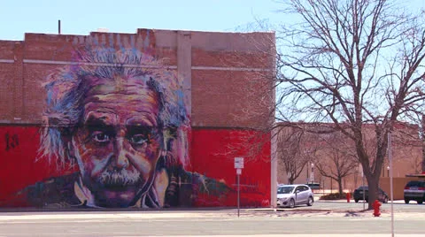 A mural of Albert Einstein is painted on a building. 스톡 동영상 26981738