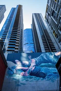 Mural art work in front of modern apartment buildings Stock Photos