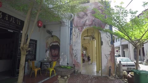 Mural of bearded man or Five foot way mouth, Muntri Street, George Town, Penang Stock Footage 162108157