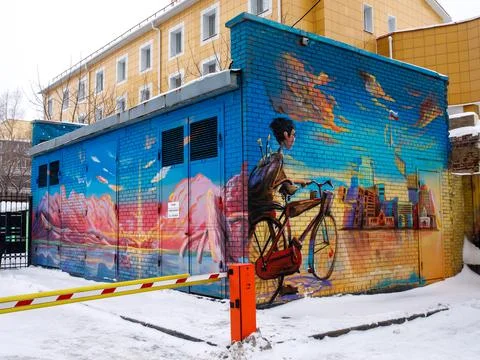 Mural graffiti Sunset painted by Dmitriy Yablonskiy . Stock Photos