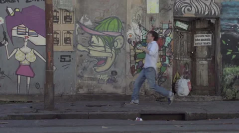  Mural -young man chasing 스톡 동영상 27845713