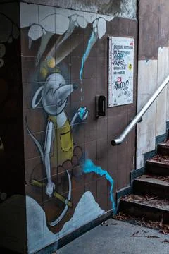 Murals of a mouse drinking water Stock Photos