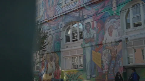 Murals with wall foreground and camera pan left to right, San Francisco Stock Footage 333576051