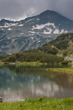 Muratovo Lake and reflection of Banski Suhodol Peak Stock Photos