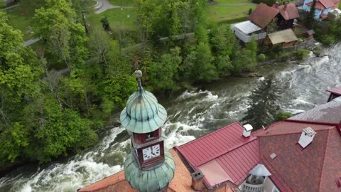 Murau, Obersteiermark, Österreich- Clock Tower over the Mur River Stock Footage 158780396