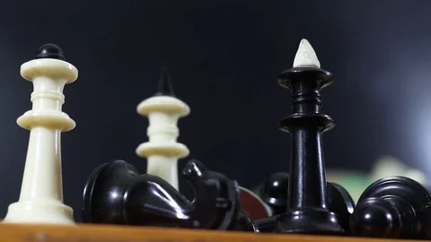 Murder defeated black king on the chessboard Stock Footage 77278887