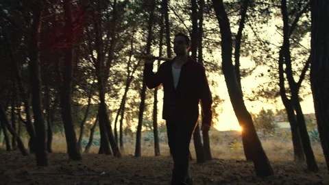 Murder Man With Axe Walk In The Forest To Find Victims to kill Stock Footage 250442827