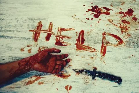 The murder victim asks for help. Stock Photos