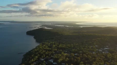 Murrays beach Lake Macquarie coastal town in aerial view from beach as 4k. Stock Footage 238954670
