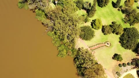 Murrays river front surface to blue sky in aerial vertical panorama at Renmark. Stock Footage 274263243