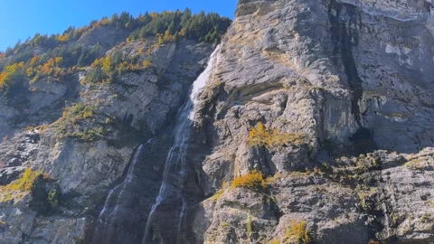 Murren Mürren Gimmelwald Mürrenbachfall waterfall Cable car gondola Swiss Alps Stock Footage 328610824
