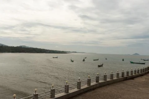 Murudeshwar temple view from inside with sea horizon and boats 写真素材