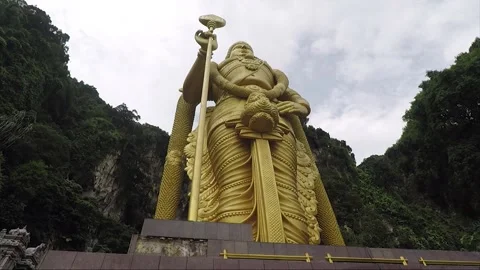 Murugan statue at Main Temple cave, Batu caves, Selangor, Kuala Lumpur, Malaysia Stock Footage 194499750