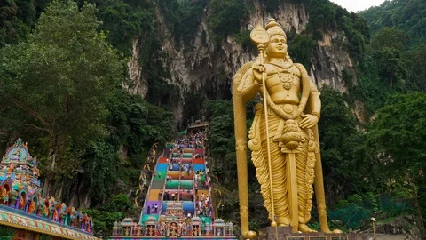 Murugan Statue Outside the Batu Caves Dynamic Movement Stock Footage 114228976