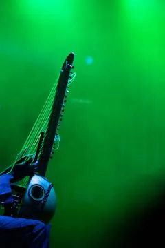 Muscian playing a string insturment called the Kora. Stock Photos