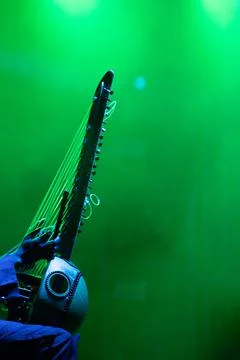 Muscian playing a string insturment called the Kora. Stock Photos