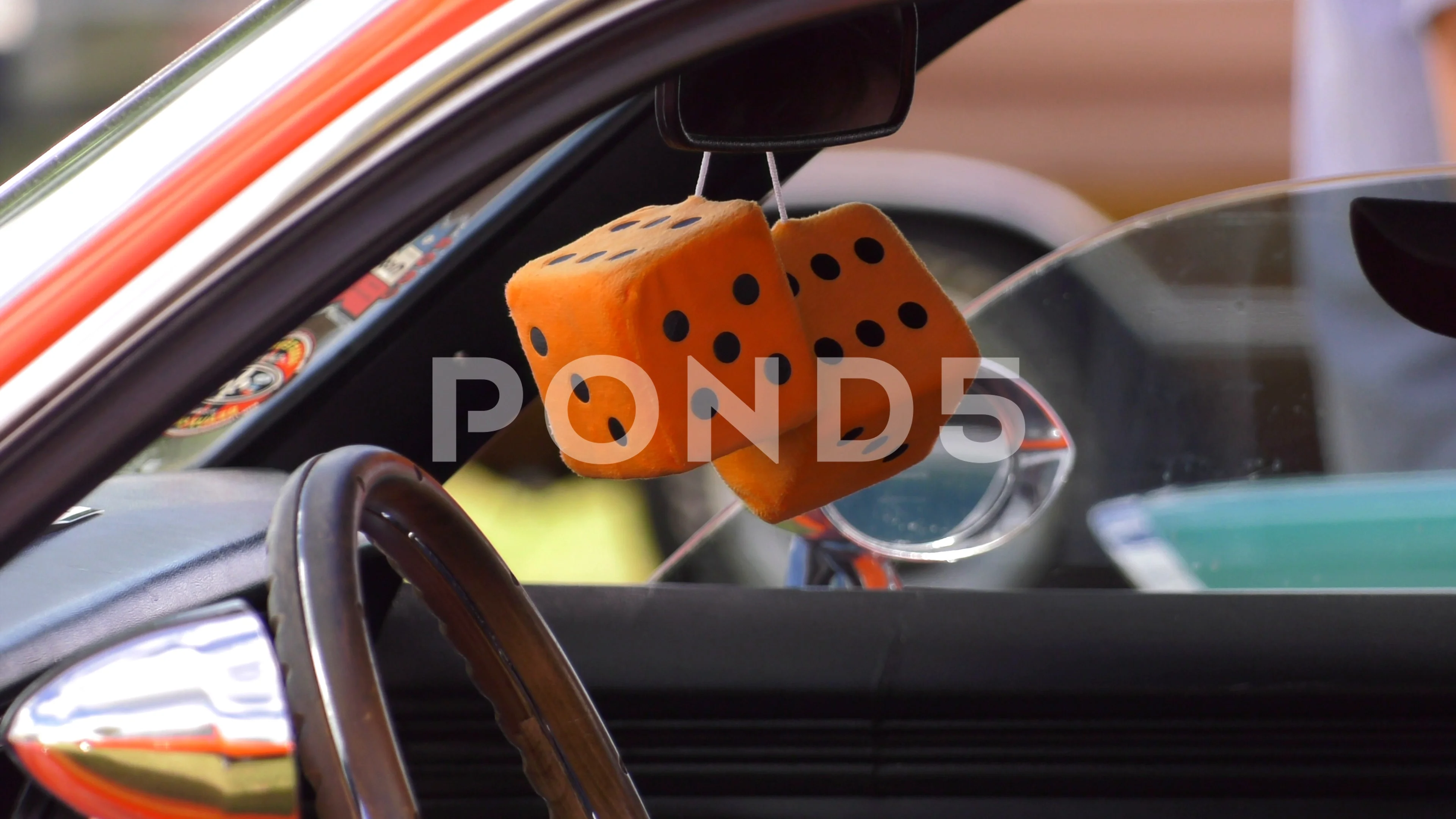 Fuzzy Dice on the Rearview Mirror Stock Photo - Image of