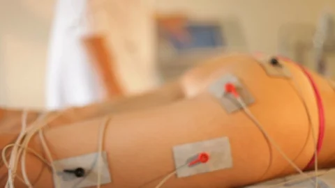 Muscle contractions in electro stimulation therapy of the butt, legs and back Stock Footage 115569150