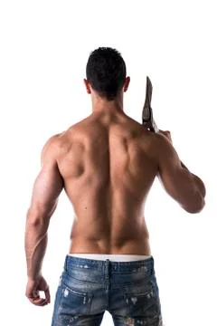 Muscle man with axe back view Stock Photos