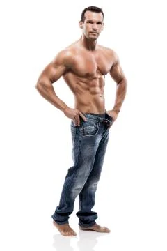 Muscle man posing in studio, isolated over a white background Stock Photos