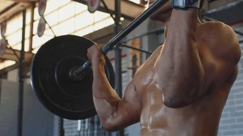 Muscles straining while lifting weights Stock Footage 71625059