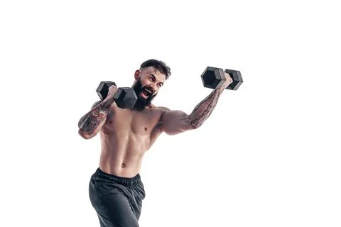 Muscular bodybuilder guy doing exercises with dumbbell over whit Stock Photos