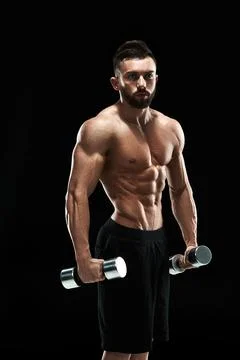 Muscular bodybuilder guy doing posing Stock Photos