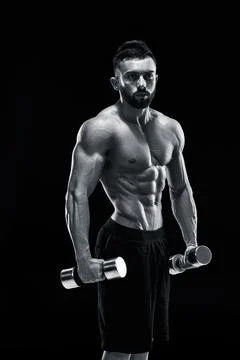 Muscular bodybuilder guy doing posing Stock-Fotos
