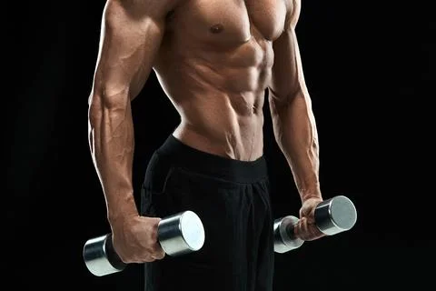 Muscular bodybuilder guy doing posing Stock Photos