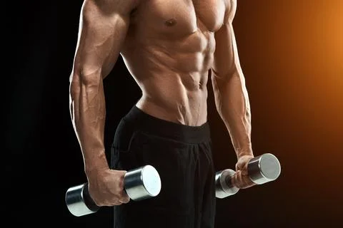 Muscular bodybuilder guy doing posing Stock Photos