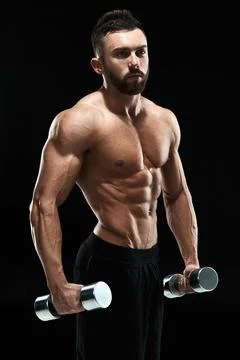 Muscular bodybuilder guy doing posing Stock Photos
