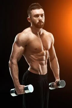 Muscular bodybuilder guy doing posing Stock Photos