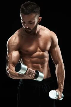 Muscular bodybuilder guy doing posing Stock Photos