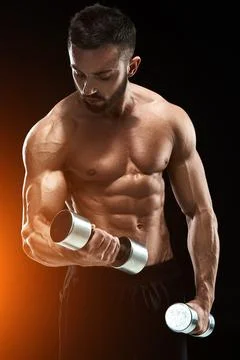 Muscular bodybuilder guy doing posing Stock Photos