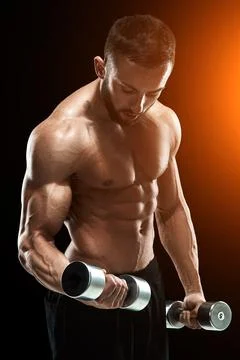 Muscular bodybuilder guy doing posing Stock Photos