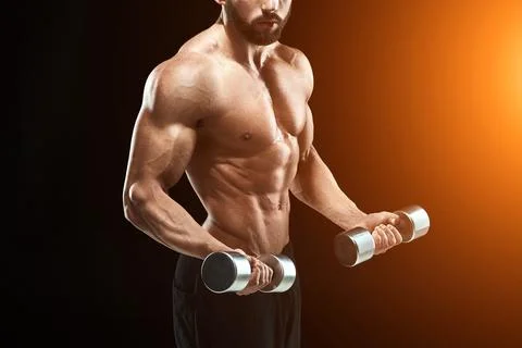 Muscular bodybuilder guy doing posing Stock Photos