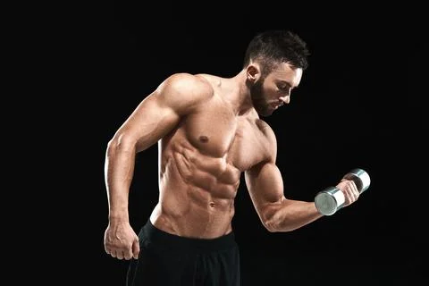 Muscular bodybuilder guy doing posing Stock Photos