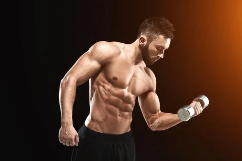 Muscular bodybuilder guy doing posing Stock Photos