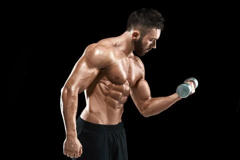 Muscular bodybuilder guy doing posing Stock Photos