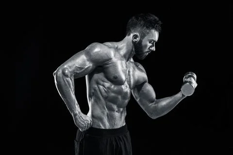 Muscular bodybuilder guy doing posing Stock Photos