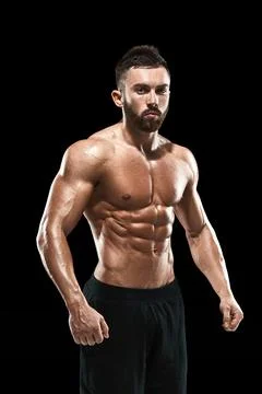 Muscular bodybuilder guy doing posing Stock Photos