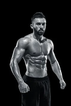Muscular bodybuilder guy doing posing Stock Photos
