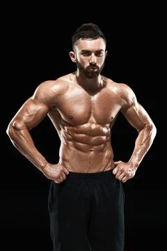 Muscular bodybuilder guy doing posing Stock Photos