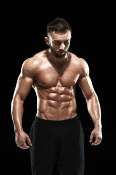 Muscular bodybuilder guy doing posing Stock Photos