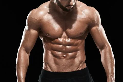 Muscular bodybuilder guy doing posing Stock Photos