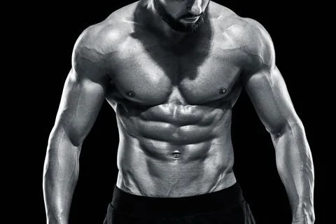 Muscular bodybuilder guy doing posing Stock Photos