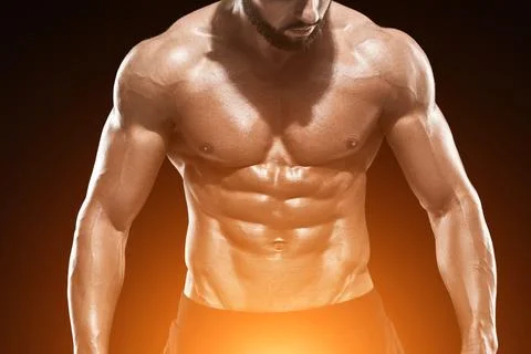 Muscular bodybuilder guy doing posing Stock Photos