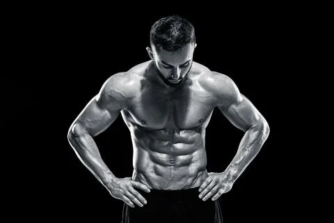 Muscular bodybuilder guy doing posing Stock Photos